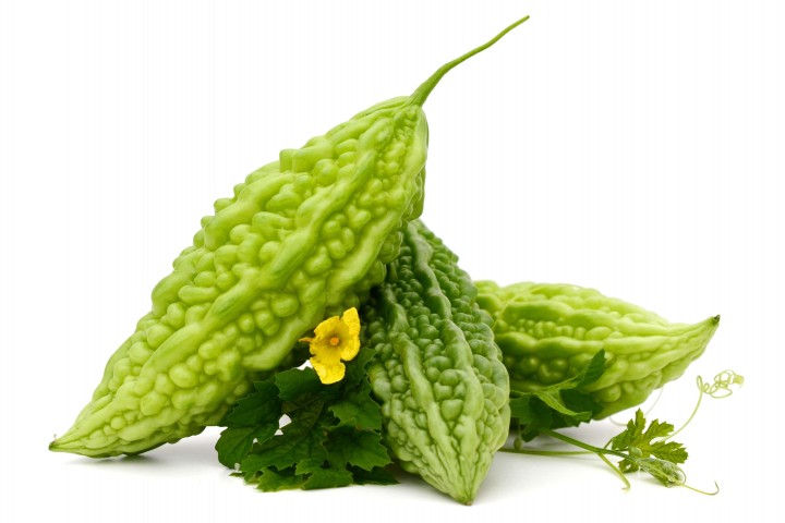 bitter melon bitter gourd with leaves on white background