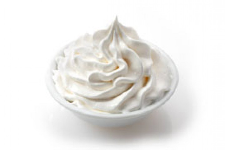 cream white color bowl filled with fresh cream