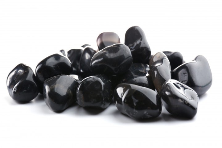 black onyx pile isolated on white background