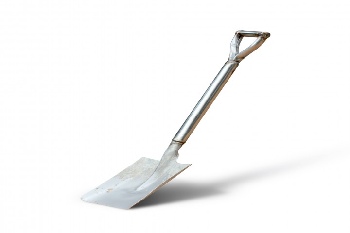 old shovel on white background
